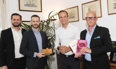 Il governatore Massimiliano Fedriga con Franco Bazzara e i figli Andrea e Marco
