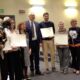Foto di gruppo con i laureati premiati