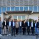Foto di gruppo all'esterno dell'area dove sorgerà il Campus a Brugnera