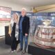L'assessore regionale Cristina Amirante con il sindaco di Cordenons, Andrea Delle Vedove, davanti agli iconici trofei esposti all'Eurosporting - Trophy Tour 2026